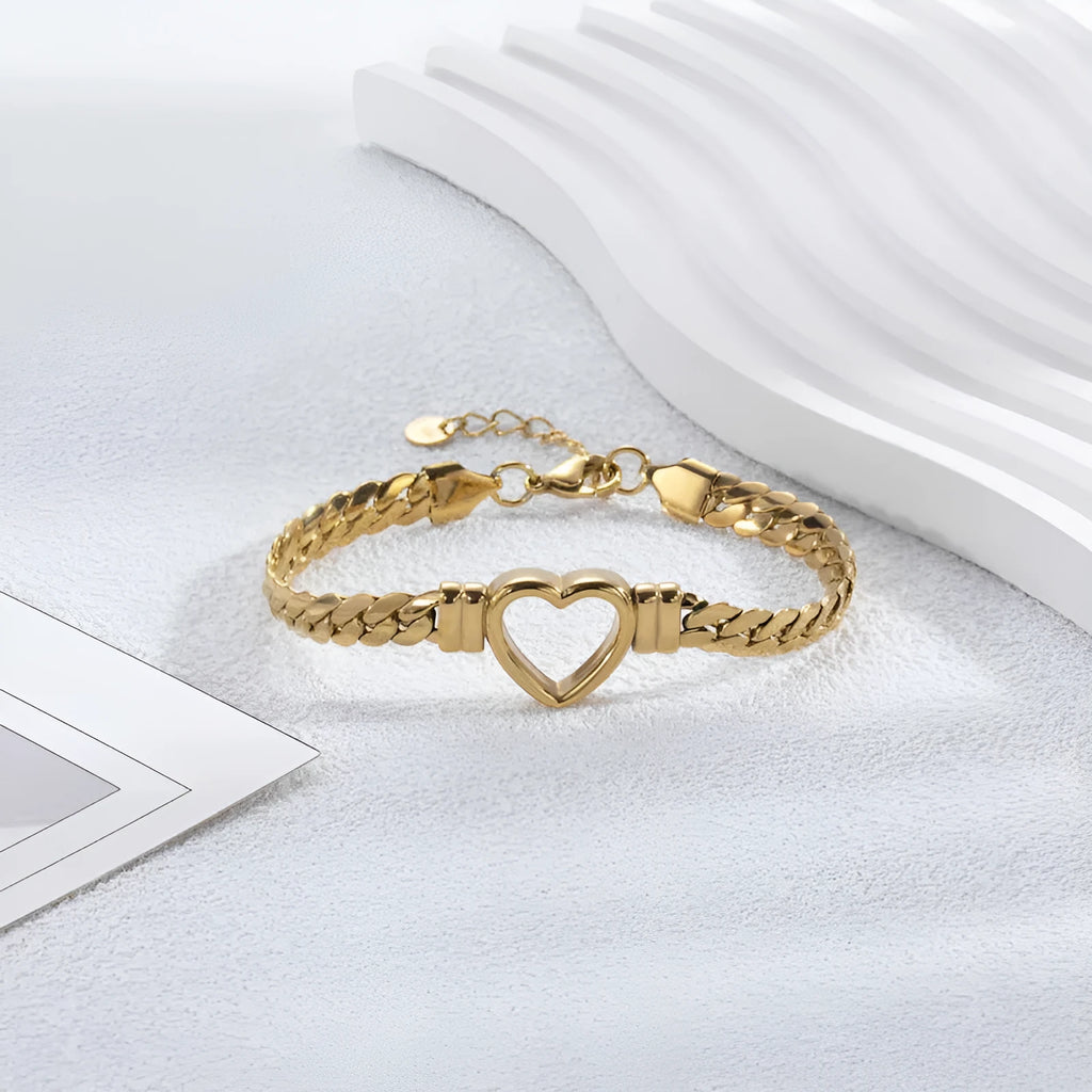 Fashion simple hollow heart titanium steel bracelet in BR-26 gold colour with electroplated finish