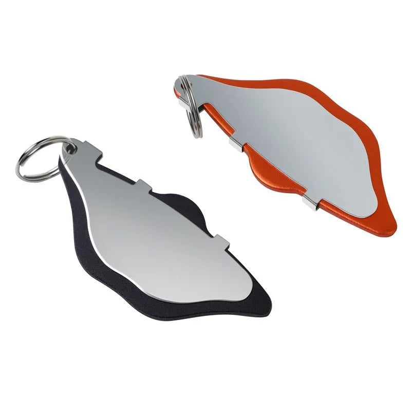Mountain bike metal disc brake pad set in black or orange with adjustment flap