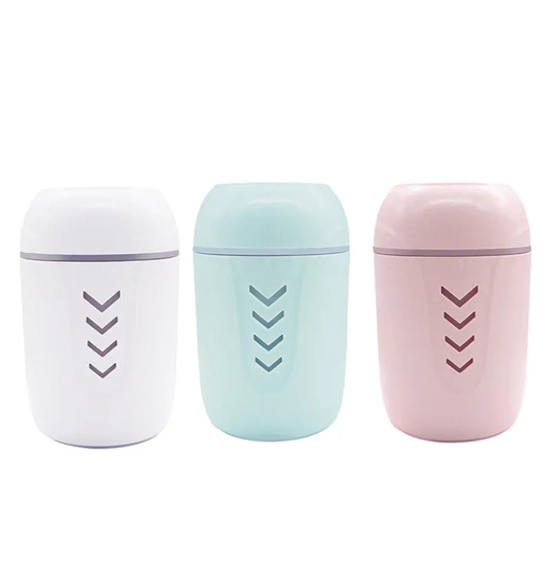 X3 portable car humidifier in blue, pink, or white with 200ml tank and USB/AC power