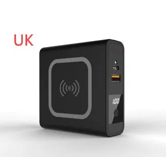 Black Super QI 10000mAh power bank with wireless charging top and foldable UK plug adapter attached.