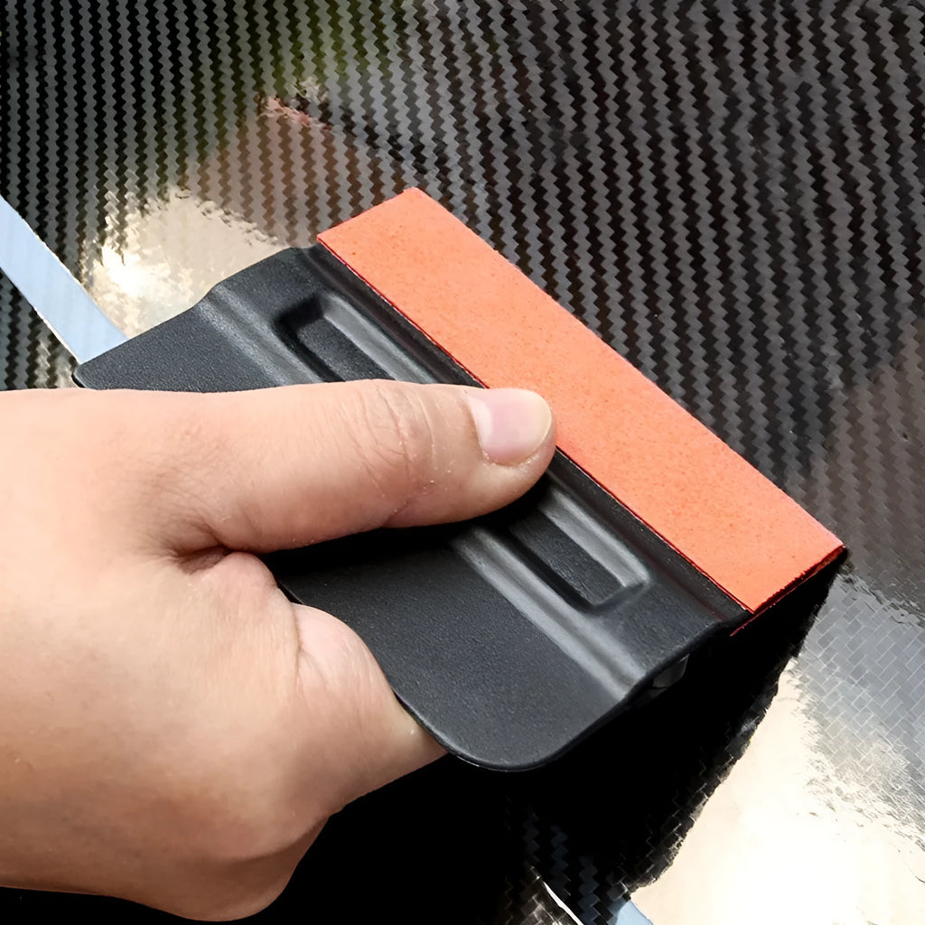ABS plastic automotive vinyl wrap scraper tool with a blue deerskin scraping pad.