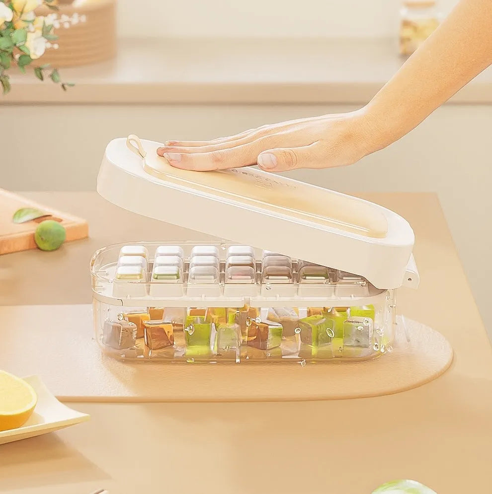 Food-grade high-capacity ice cube tray in blue with integrated storage for an ice shovel.