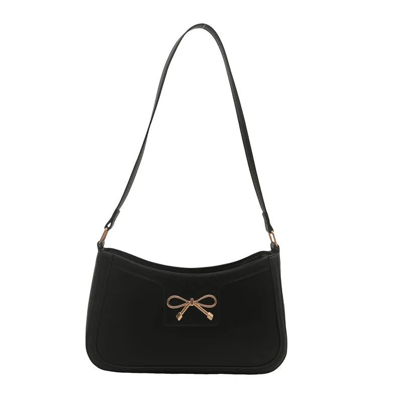 PU leather Western style baguette shoulder bag with bow detailing in six colour options