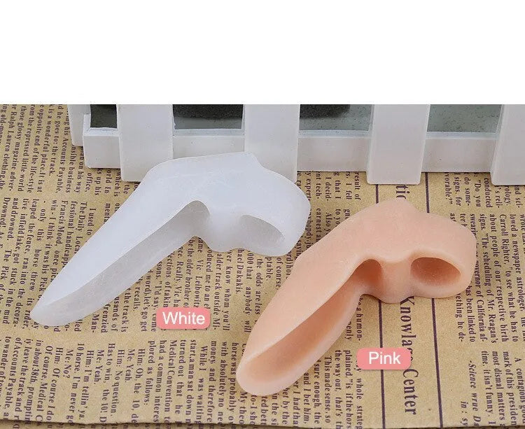 Silicone bunion corrector with double-hole SEBS toe separator for hallux valgus, in skin colour or white.