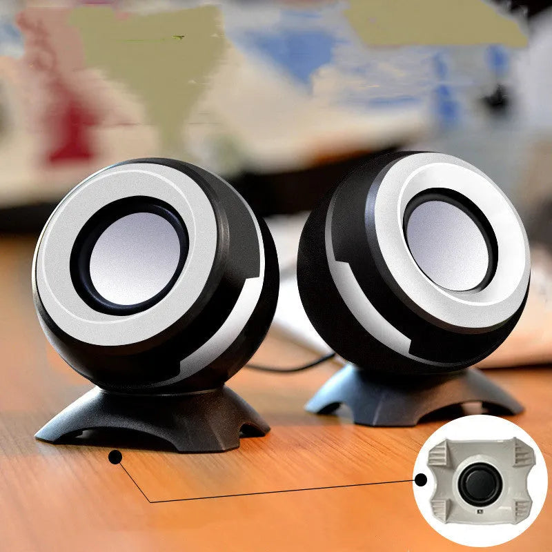 Compact black and gold USB-powered stereo desktop speakers for laptop and computer.