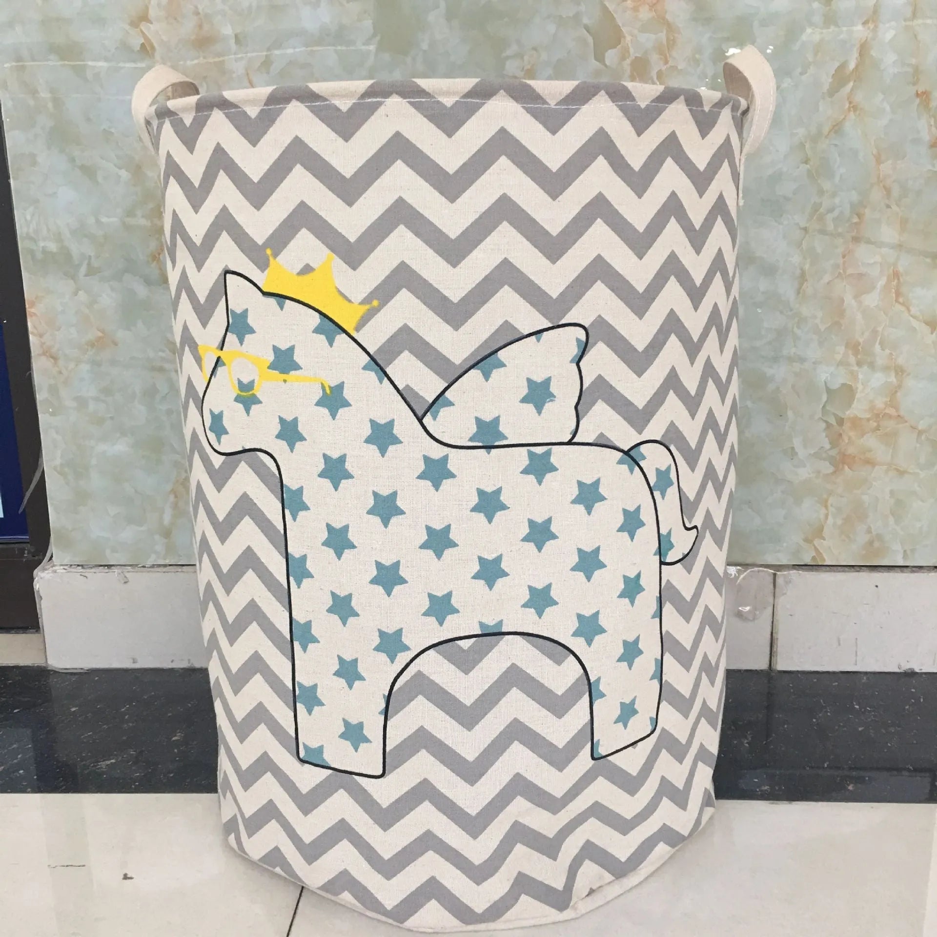 Cotton linen storage bucket with five-pointed star and horse design in a home setting