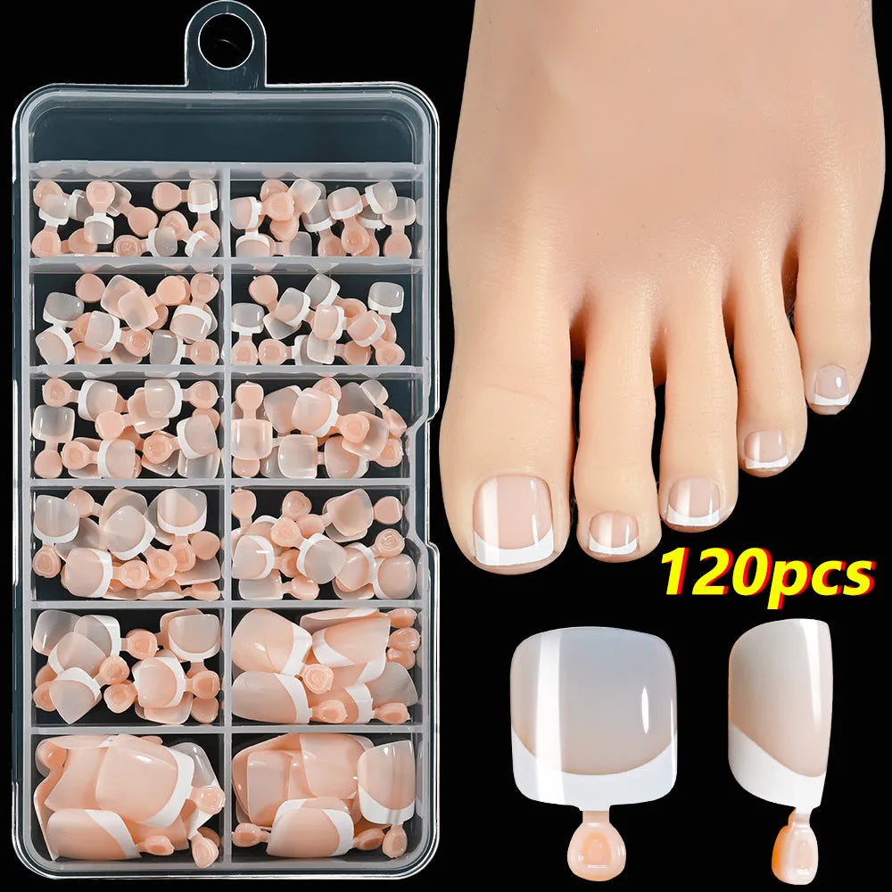 Open box showing 120 French white edge nude square false toe nail pieces in various shades.