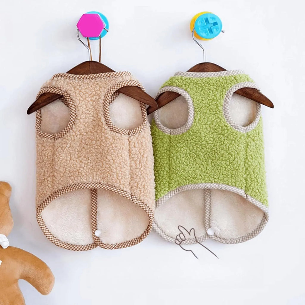 Green coral fleece dog sweatshirt vest with a leash ring on a small dog.