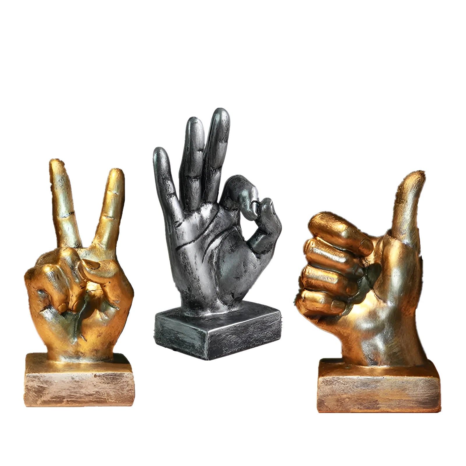 Resin hand gesture ornament in metallic finish on wooden surface