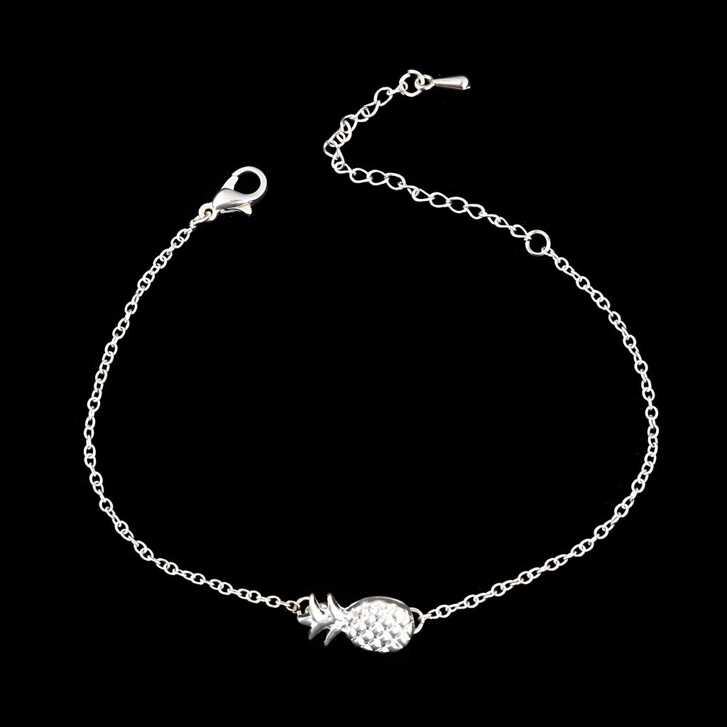 Women's alloy pineapple charm bracelet in gold or silver finish from XINGX series.