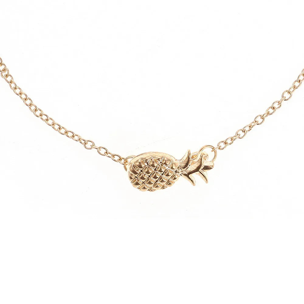Women's alloy pineapple charm bracelet in gold or silver finish from XINGX series.