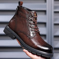 Men's black leather work ankle boots with patent finish and rubber sole for haulage motor environments