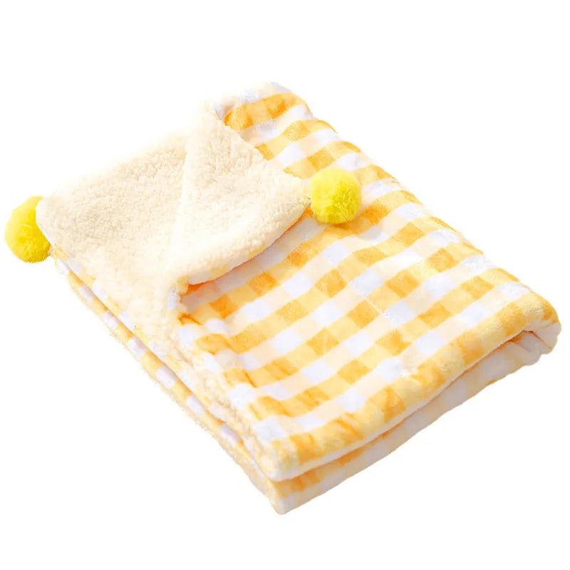 Blue coral fleece pet blanket for a dog, shown on a sofa, with size options S, M, L, XL.