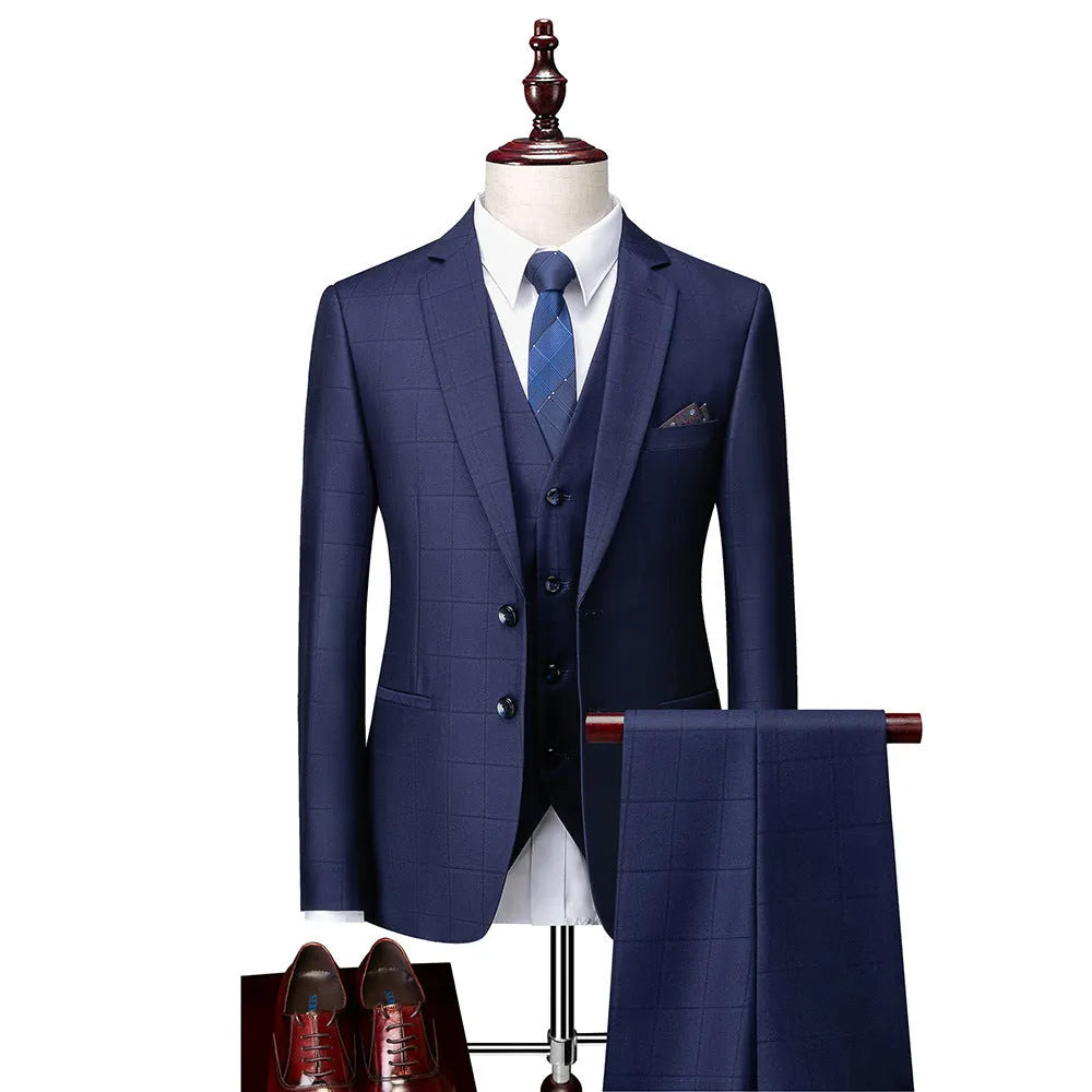 Men's navy blue plaid slim fit three-piece suit with jacket, vest and trousers on hanger