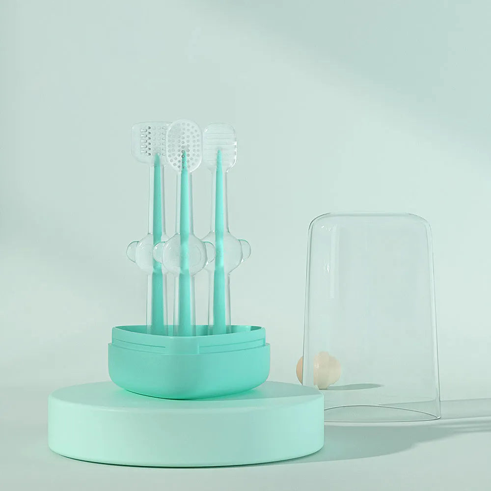 Blue, green, and purple pet toothbrushes with soft silicone bristle heads for dogs and cats.