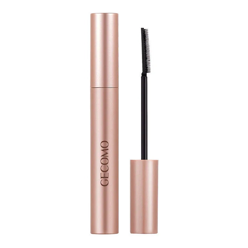 Black natural curly long mascara container with curved brush applicator showing 14cm length