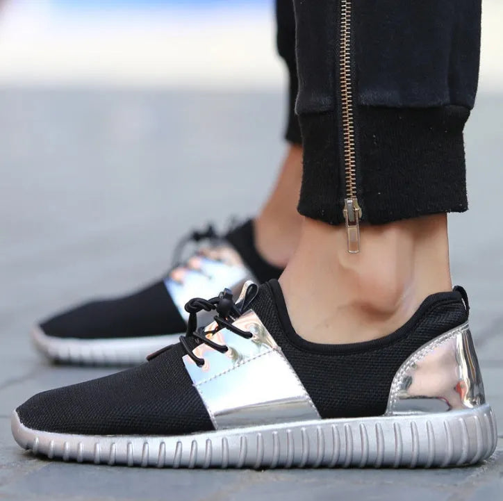 Breathable mesh casual flat shoes for men and women with lace-up closure and rubber outsole