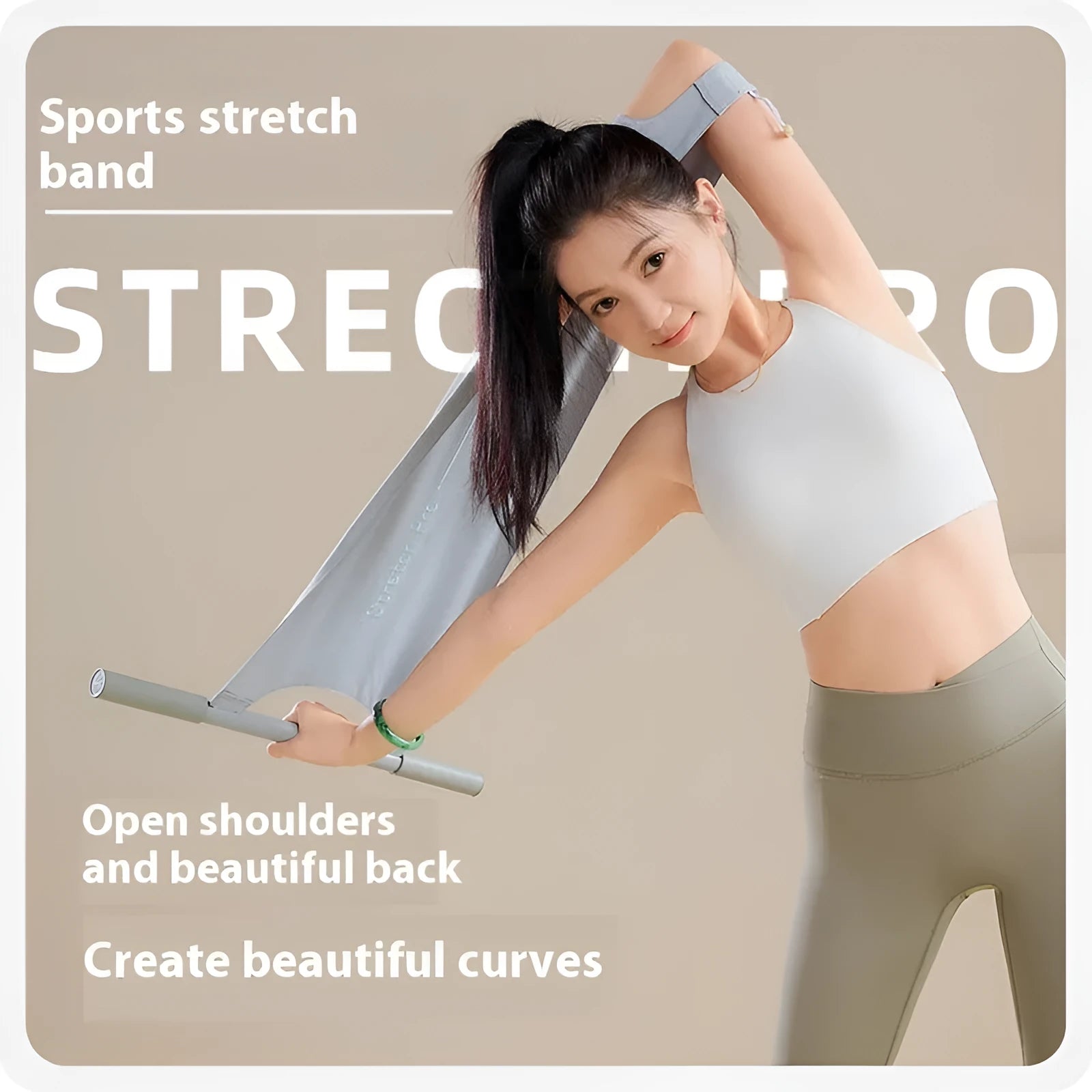 Grey and pink 42cm long yoga stretching tool with curved design for shoulder and back stretches.