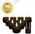 Four black S10 LED tealight candles showing their size and flickering flame effect.