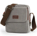 Canvas shoulder bag in khaki with polyester lining, small size 20x7x23cm, shown as a structured day bag
