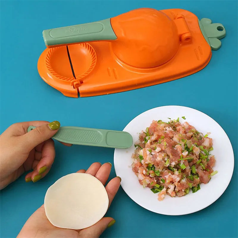 Orange and white manual dumpling skin press tool with ergonomic handle and hanging hole