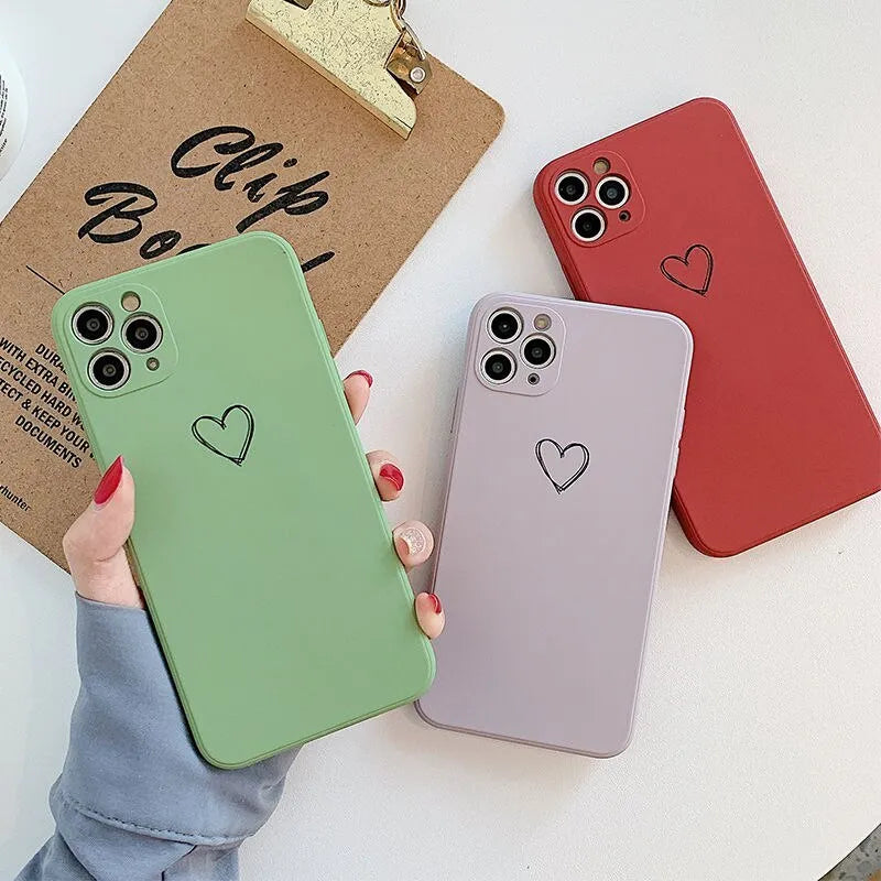 Silicone TPU phone case for Apple iPhone in solid colours black, green, pink, purple, red, white, grey, and light green.