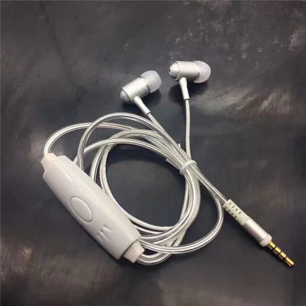 Blue, green, and pink LED earphones with glowing cables next to a smartphone, showcasing their music-reactive light feature.
