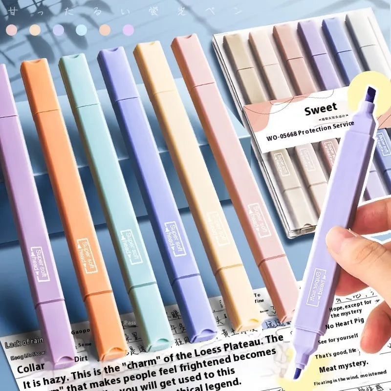 Set of double headed fluorescent highlighter pens showing two different coloured tips on each pen.