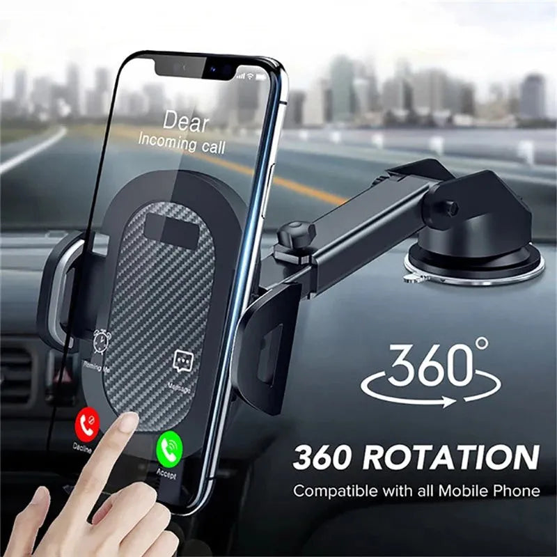 Black adjustable car phone holder with clamp for 4-7 inch smartphones on a car dashboard.