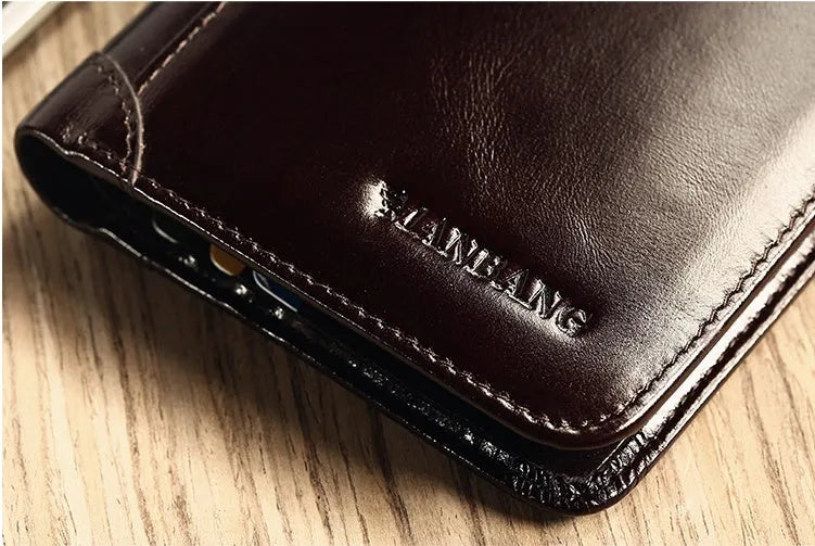 Men's black full-grain leather bifold wallet open, showing card slots, zip coin pocket, and banknote section.
