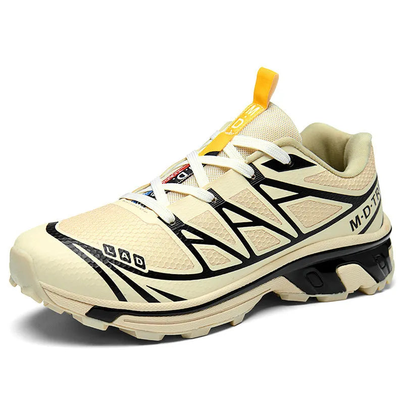 Pair of low-top hiking shoes in artificial leather with a mesh lining and rubber sole.