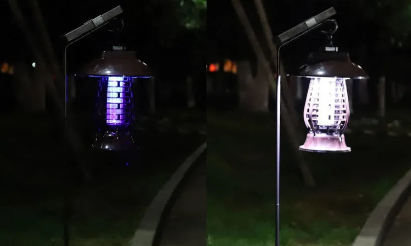 White and black solar-powered outdoor mosquito lamp with solar panel on top and LED light body.