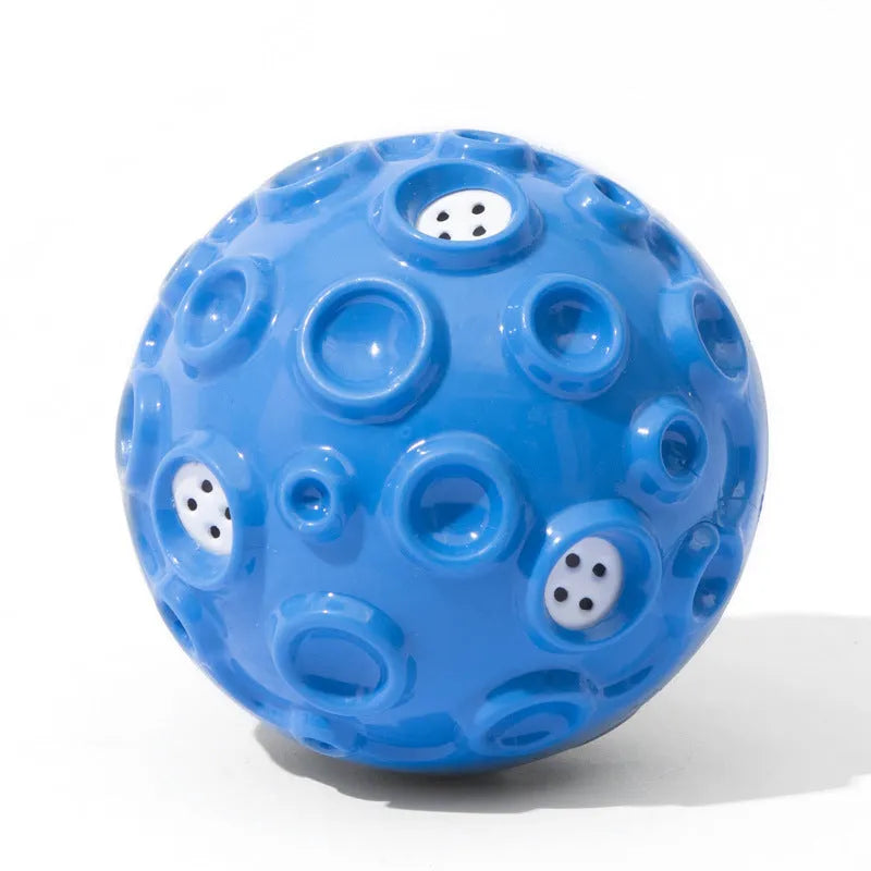 Durable rubber dog chew ball in multiple colours with squeaky sound and teeth-cleaning bumps.