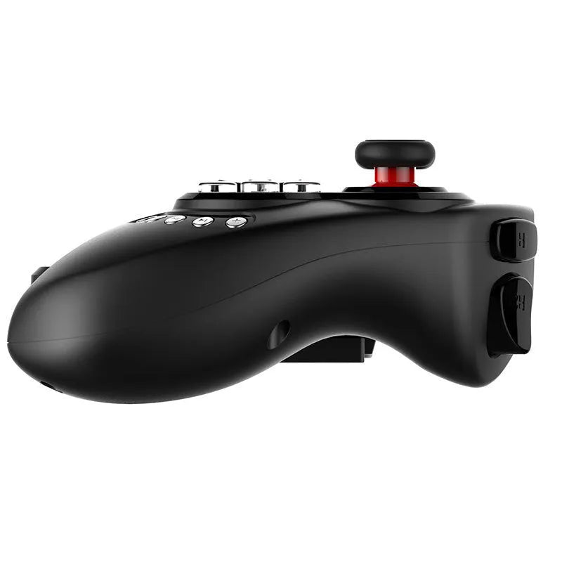Wireless telescopic gamepad controller extended with mobile phone inserted showing ABS plastic construction