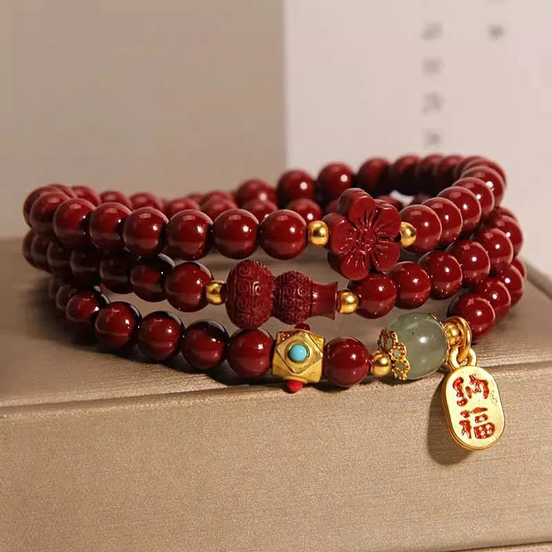 6mm cinnabar bracelet with multi-circle gourd and five petal flower Chinese design in polished finish