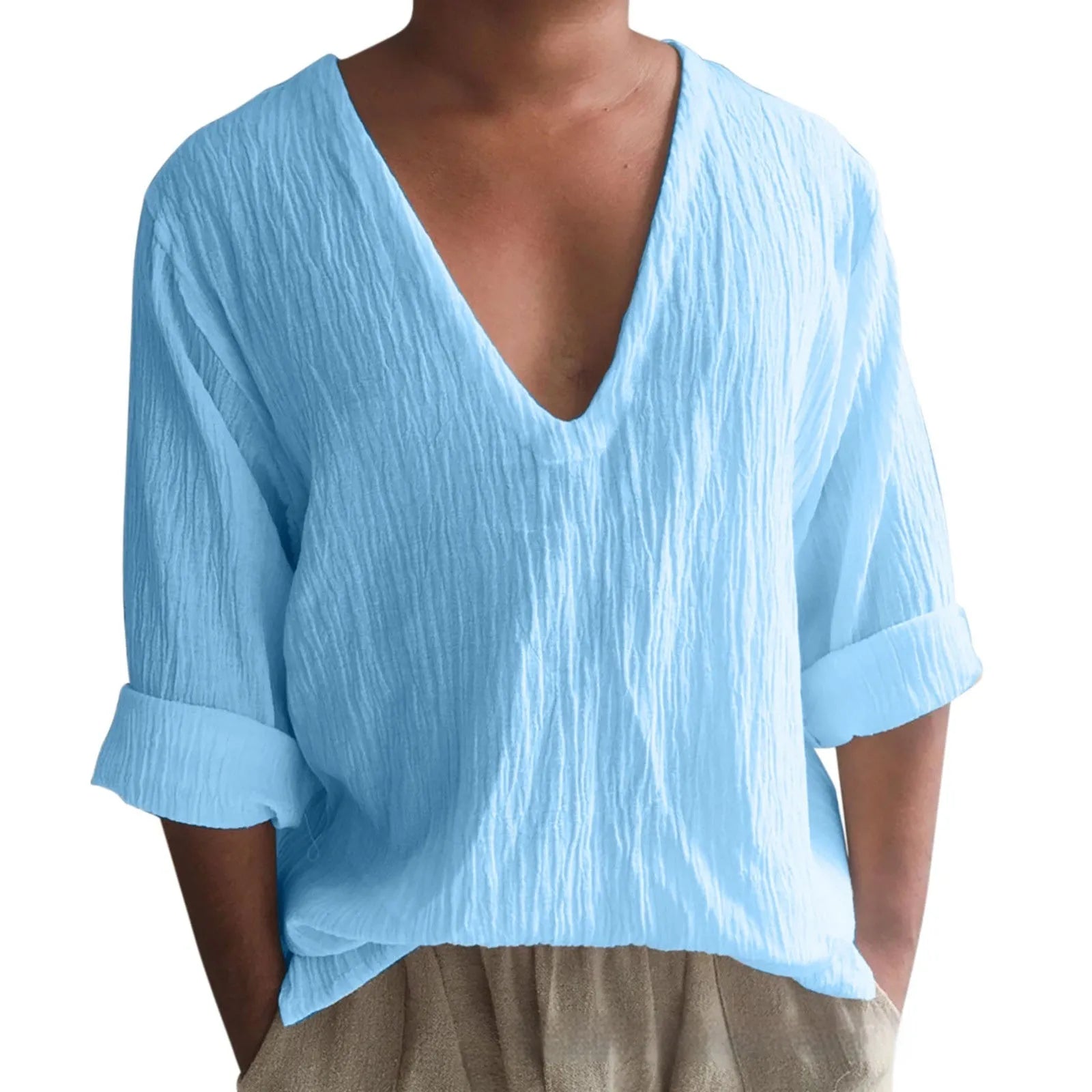 Man wearing a washed cotton long sleeve V-neck t-shirt in a solid colour.