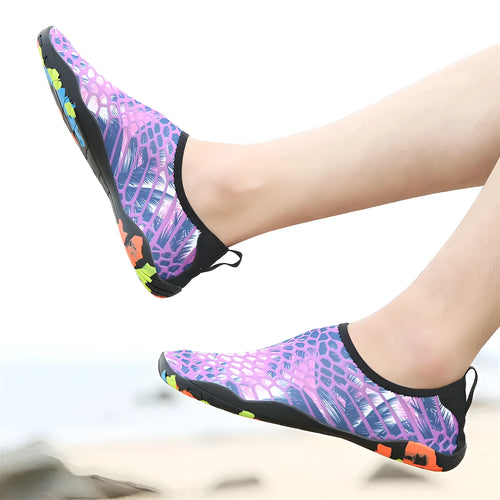 Blue Lycra beach wading shoes with EVA sole for men and women, shown on a sandy background.