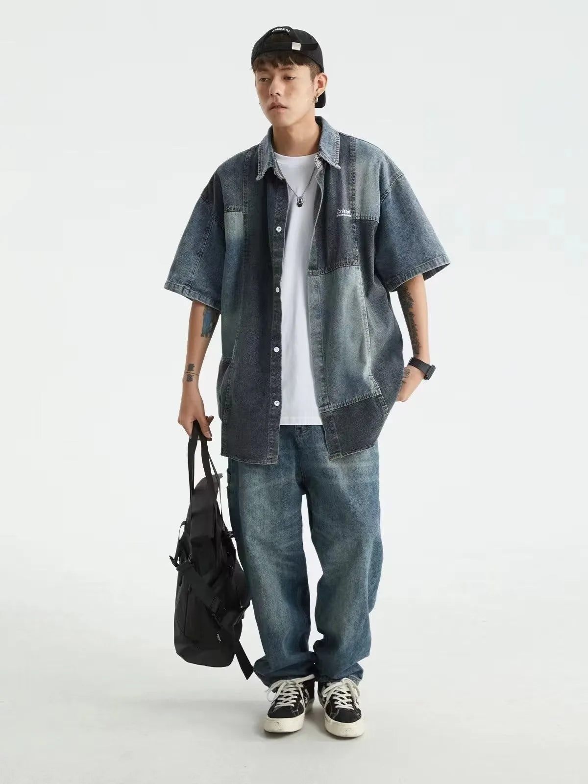 Blue men's Japanese-style retro denim shirt with washed stitching detail and loose cardigan fit