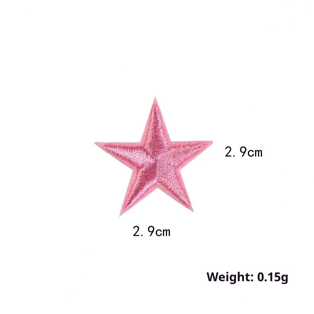 Colourful five-pointed star cloth embroidery stickers for DIY clothing decoration on a fabric background.