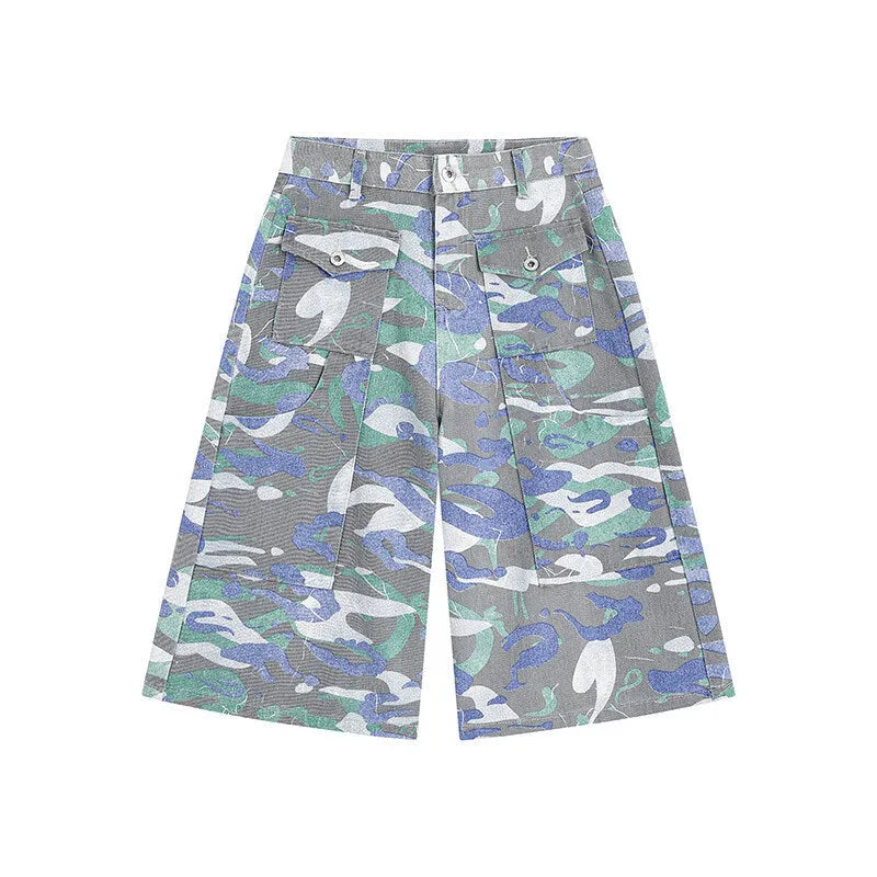 Women's cropped camouflage denim cargo trousers with a pocket on the leg.