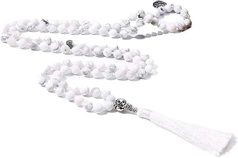 Handmade knotted stone bead necklace with 108 beads, showing geometric design and natural stone colours.
