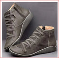 Women's casual round-toe ankle boots with a flat wedge heel, shown in multiple colours including leopard print.