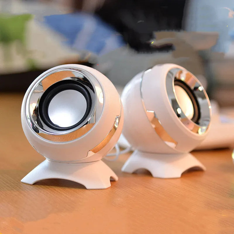 Compact black and gold USB-powered stereo desktop speakers for laptop and computer.