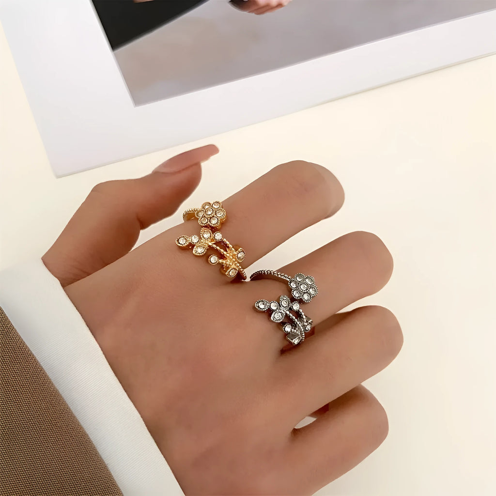 Copper open ring with flower and leaf design in gold or white diamond-treated finish
