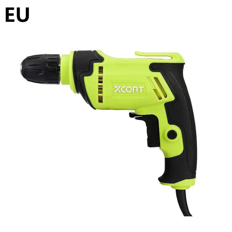 450 watt pistol-grip electric drill on a workbench, showing its compact size and keyless chuck.