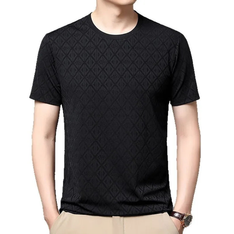 Man wearing a solid colour loose-fit Jacquard pattern short sleeve t-shirt for casual leisure.