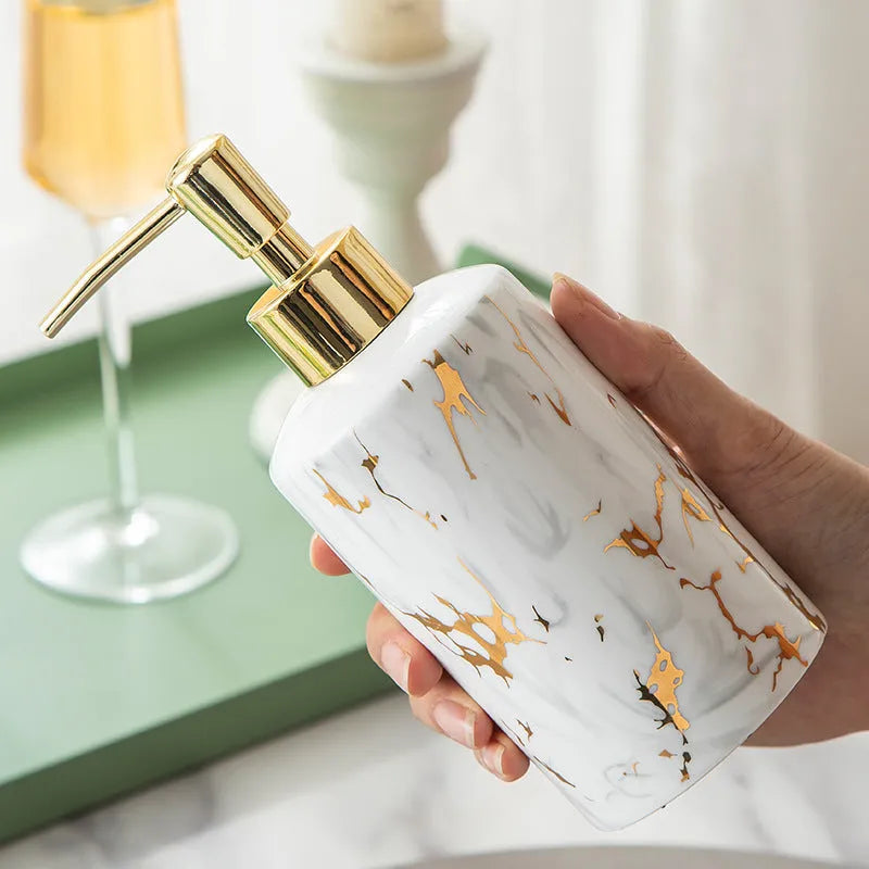 White ceramic bathroom wash kit with marble design showing two cups, latex bottle, and soap box
