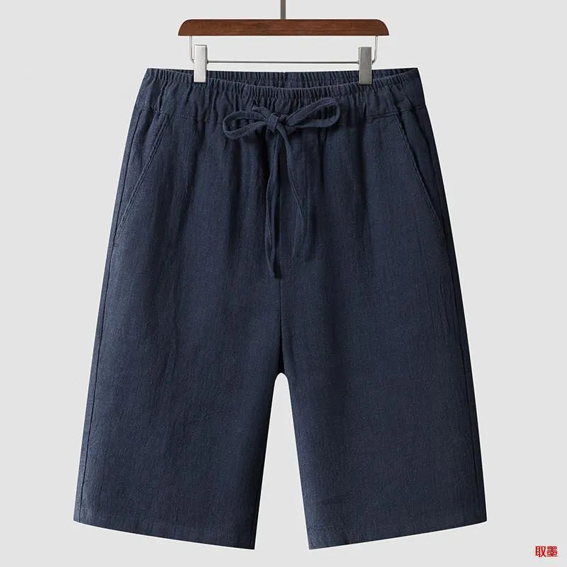 Men's linen shorts in loose cropped style with elastic waistband in various colours