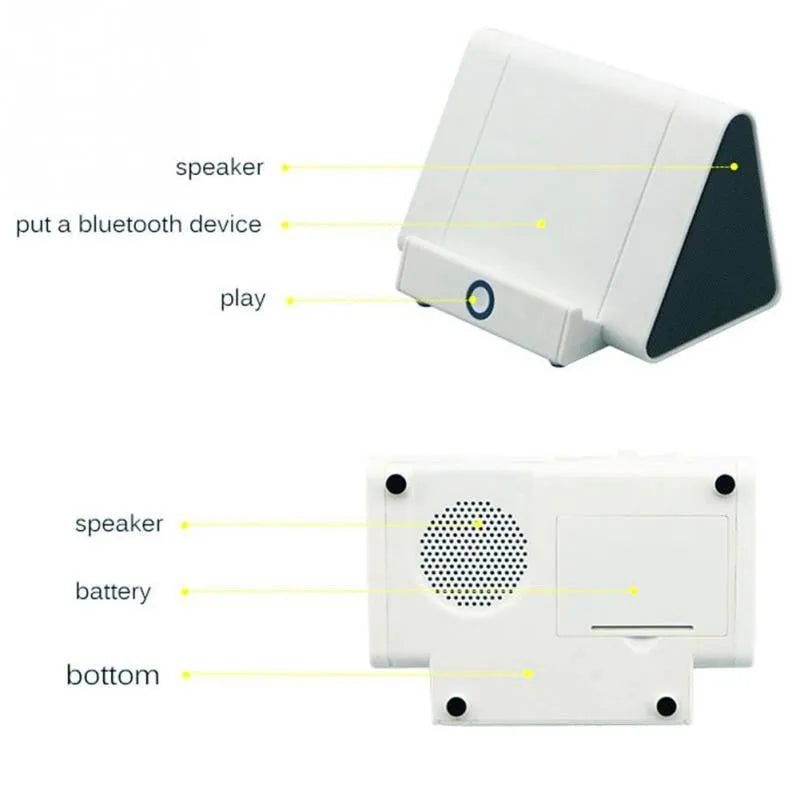 Black and white wireless mini Bluetooth speaker with built-in charging cable