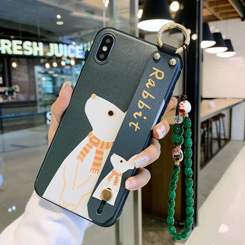 Samsung Galaxy phone case with folding bracket extended, showing floral pattern design